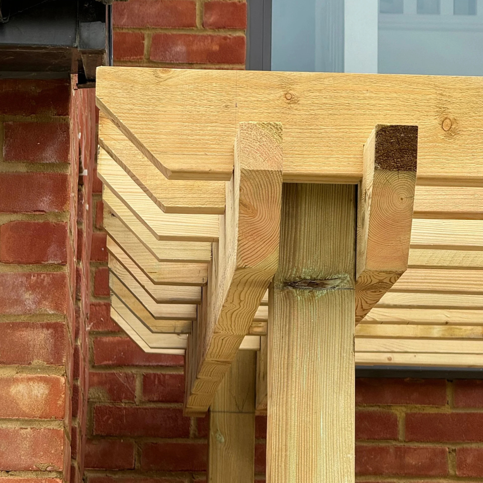 Close-up of timber frame joinery on outdoor wooden structure